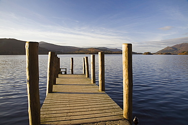 Wooden jetty at Barrow Bay landing on Derwent Water looking north west in autumn, Keswick, Lake District National Park, Cumbria, England, United Kingdom, Europe