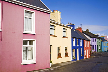 Row of colourful traditional houses in main street of historical village on Ring of Beara tourist route, Eyeries, Beara Peninsula, County Cork, Munster, Republic of Ireland, Europe