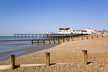 Deserted pebble beach at low tide and pier from east side, Bognor Regis, West Sussex, England, United Kingdom, Europe