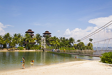 Palawan Beach, lookout towers on small island, the southernmost point of continental Asia, and rope suspension footbridge across sea lagoon, Sentosa Island, Singapore, Southeast Asia, Asia