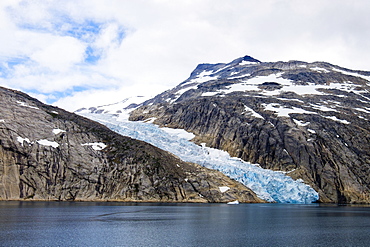 Head of a glacier calving into Prince Christian Sound (Prins Christians Sund) in summer, Kujalleq, Greenland, Polar Regions