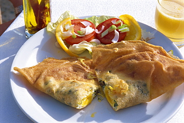 A bric, deep fried turnover, with salad in Tunisia, North Africa, Africa