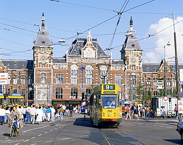 Tram and Central Station, Amsterdam, Holland, Europe