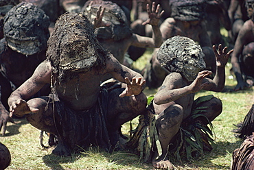 Mud men wearing clay masks perform ritual dance, Asaro Valley, Papua New Guinea, Pacific Islands, Pacific