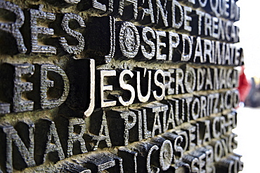 Close up of writing which fills the bronze doors of the Sagrada Familia, UNESCO World Heritage Site, Barcelona, Catalonia, Spain, Europe