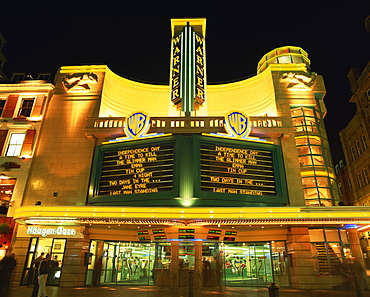 Exterior of the Warner Cinema illuminated at night, Leicester Square, London, England, United Kingdom, Europe