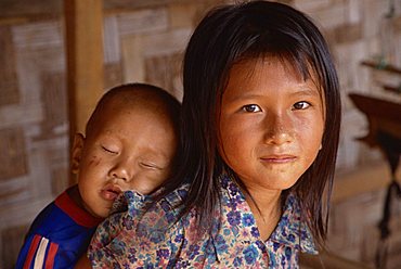 Hmong girl carrying her brother, Laos, Indochina, Southeast Asia, Asia