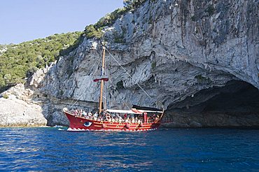 Tourist boat at Papanikolis Cave, Meganisi, Ionian Islands, Greek Islands, Greece, Europe