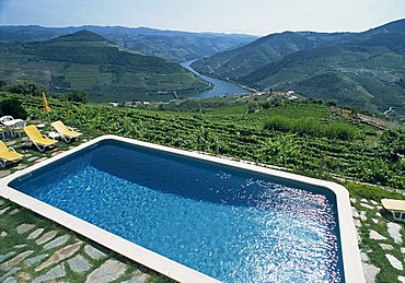 Swimming pool above vineyards near Pinhao, Douro region, Portugal, Europe