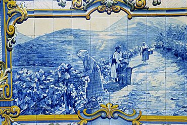 Azulejos showing harveting of port grapes, Pinhao railway station, Douro region, Portugal, Europe