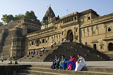 The ghats on the Narmada River at the Ahilya Fort and Temples, Maheshwar, Madhya Pradesh state, India, Asia