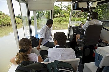 Tourist boat on way to Mawabi Lodge, Tortuguero, Costa Rica, Central America