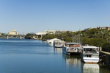 Tourist boats on the Rio Guadalquivir, Seville, Andalusia, Spain, Europe