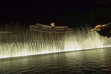 The Bellagio Hotel at night with its famous fountains, the Strip (Las Vegas Boulevard), Las Vegas, Nevada, United States of America, North America