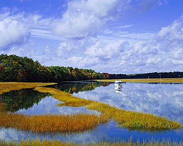 Still water reflecting the sky near Kennebunkport, Maine, New England, USA