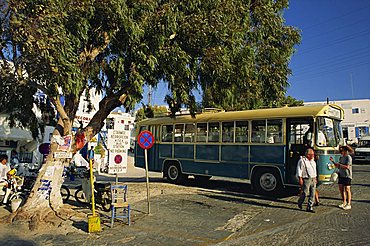 Local bus at the terminal in Mykonos town on the island of Mykonos, Cyclades Islands, Greek Islands, Greece, Europe