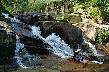 The waterfalls and rocks at Aboretum Forest Recreation Park in Penang, Malaysia, Southeast Asia, Asia