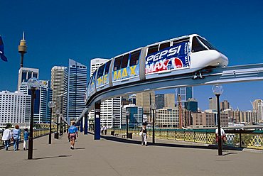 The Monorail at Darling Harbour with the city skyline beyond, Sydney, NSW, Australia