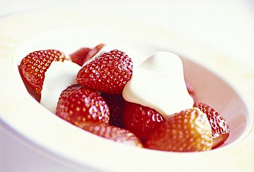 Bowl of strawberries and cream