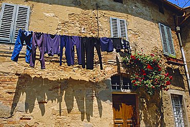 Volterra, Tuscany, Italy. Washing hanging on a line