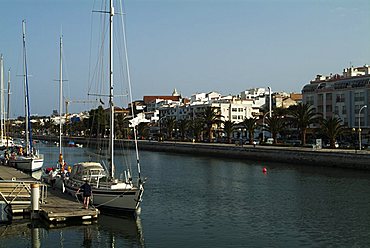 The sea channel leading to the Marina, Lagos, Algarve, Portugal, Europe