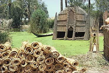 Mudhif' meeting house and reed mats ready for sale, Chobaish Marshes, Iraq, Middle East