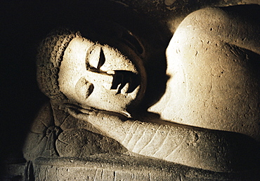 Detail of stone carving of the Buddha, Ellora Caves, UNESCO World Heritage Site, Maharashtra state, India, Asia