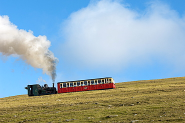 Steam train on route between Llanberis and the summit of Mount Snowdon in Snowdonia National Park, Gwynedd, Wales, United Kingdom, Europe