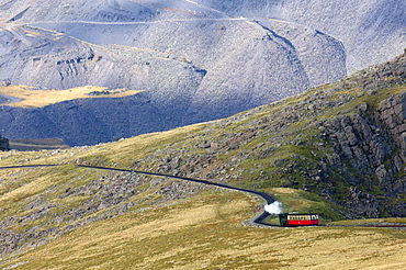 Steam train on route between Llanberis and the summit of Mount Snowdon in Snowdonia National Park, Gwynedd, Wales, United Kingdom, Europe