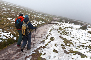 Hikers descend from Pen-Y-Fan summit in The Brecon Beacons National Park, Powys, Wales, United Kingdom, Europe