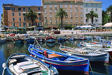 Fishing boats moored in the harbour and waterfront at Ajaccio, island of Corsica, France, Mediterranean, Europe