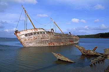 Ship wreck in Le Fret harbour in Brittany, France, Europe