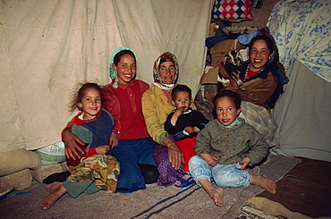 Portrait of a Berber family, women and children, inside a tent in the desert, southern Morocco, North Africa, Africa