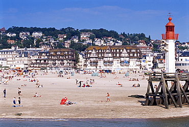 Beach and lighthouse, Trouville, Basse Normandie (Normandy), France, Europe