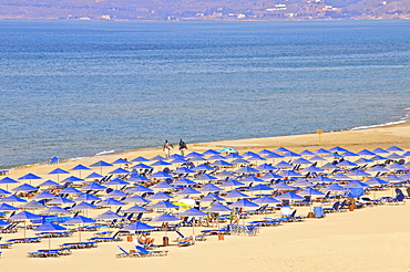 Beach and sunshades on beach at Giorgioupolis, Crete, Greek Islands, Greece, Europe