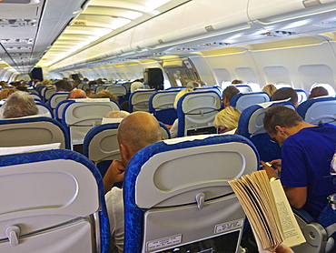 Airbus A320 plane inside cabin with passengers, France, Europe