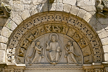 Christ in Majesty between two angels in Main porch of St. Sauveur Basilica built between the 12th and 15th centuries, Tomb of the heart of Dugesclin, Dinan, Brittany, France, Europe 