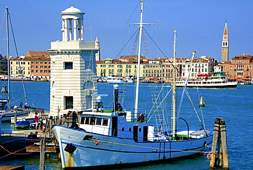 Light house and campanile and Danieli Hotel, seen from Isola di San Giorgio Maggiore, Venice, UNESCO World Heritage Site, Veneto, Italy, Europe