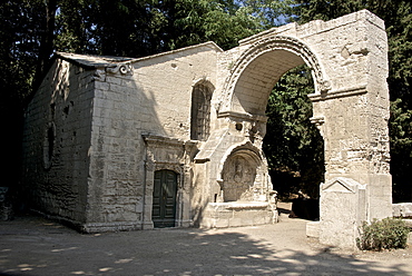 Arch of the 12th century Saint Cesaire Abbey, Alyscamps,¬† gallo-roman necropolis, Arles, Bouches du Rhone, Provence, France, Europe