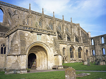 Norman arch and flying buttresses, Malmesbury Abbey, Malmesbury, Wiltshire, England, United Kingdom, Europe