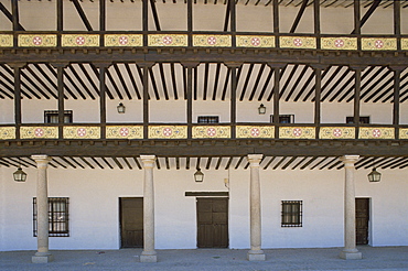 Columns and verandah on a building on the Plaza Mayor in Tembleque in Castile la Mancha (Castilla la Mancha), Spain, Europe