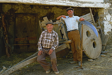 Portrait of two farmers wearing berets and looking at the camera, in Galicia, Spain, Europe