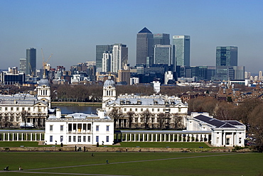 View from Greenwich Park overlooking the Royal Maritime Museum, UNESCO World Heritage Site, with Docklands and Canary Wharf on the other side of the Thames, London, England, United Kingdom, Europe