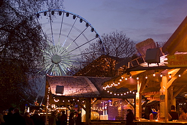 View of Ferris Wheel and food and drink stands, Winter Wonderland Christmas Fair, Hyde Park, London, England, United Kingdom, Europe