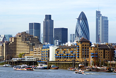 A view of the City of London looking northwest across the Thames, with Spitalfields Tower, the Gherkin (Axa) and NatWest Tower, London, England, United Kingdom, Europe