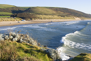 The beach with surfers at Woolacombe, Devon, England, United Kingdom, Europe