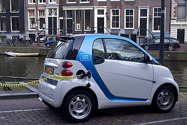 Charging an electric car, Amsterdam, Netherlands, Europe