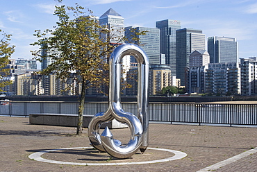 Curlicue by William Pye along the Thames, and view of Canary Wharf, Greenland Dock, London, England, United Kingdom, Europe