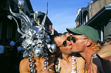 Gays kissing in Bourbon Street, Mardi Gras, New Orleans, Louisiana, United States of America, North America