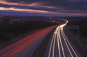 Traffic light trails in the evening on the M1 motorway near junction 28, Derbyshire, England, United Kingdom, Europe